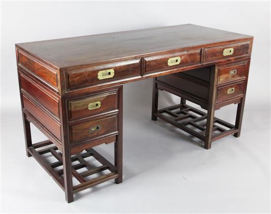 A Chinese hardwood twin pedestal desk, W.153cm D.67cm